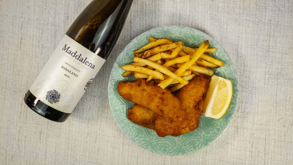 fish and chips with a bottle of wine